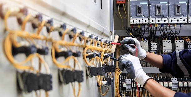 Professional Electrician technician working in Centennial Park, AZ